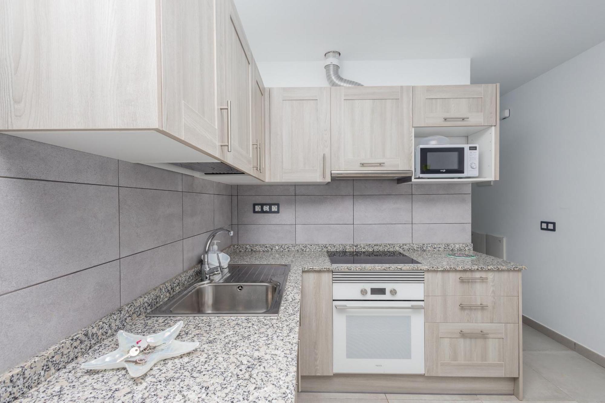 Lightbooking Apartamento Con Terraza En Playa De Arinaga อากวีเมส ภายนอก รูปภาพ
